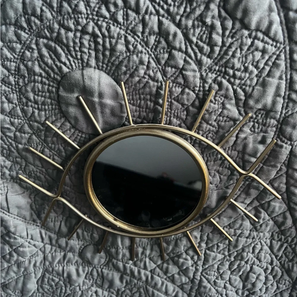 Like new gold metal eye mirror